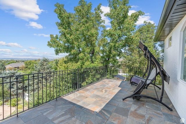 view of patio / terrace featuring a balcony