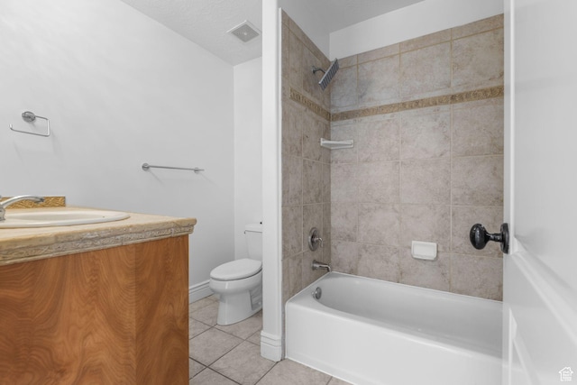 full bath featuring vanity, tile patterned flooring, toilet, visible vents, and bathtub / shower combination
