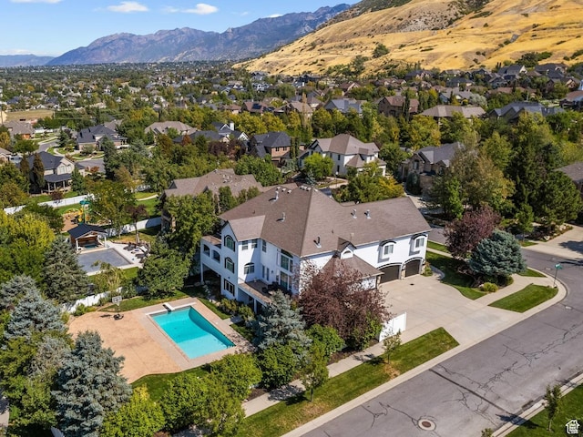aerial view with a residential view and a mountain view