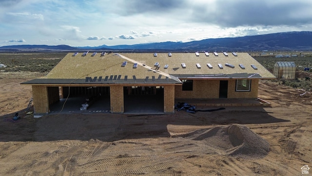 6400 N 3975 W, Cedar City, UT 84721 - property in mid-construction featuring a garage, a patio, a mountain view, and dirt driveway