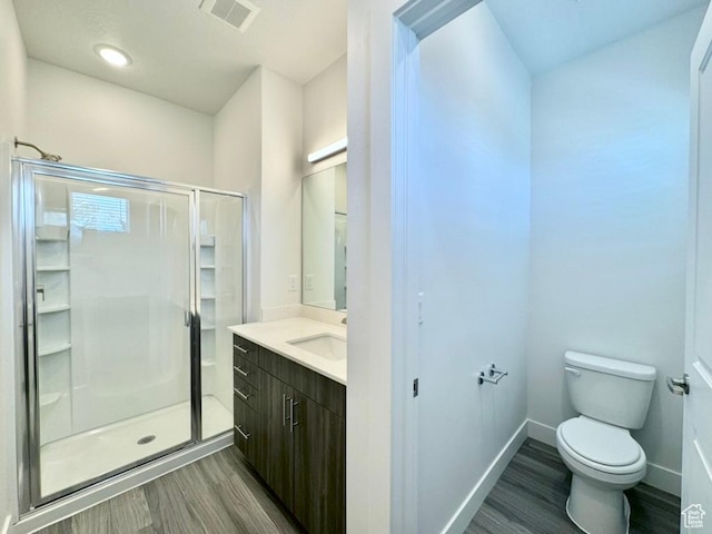 2321 W Leigh Ln Unit M55, West Haven, UT 84401 - full bath featuring visible vents, toilet, a stall shower, and wood finished floors