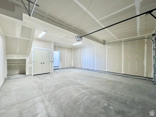 2321 W Leigh Ln Unit M55, West Haven, UT 84401 - garage featuring a garage door opener