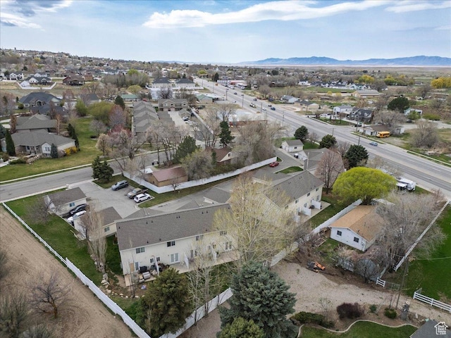 birds eye view of property with a residential view and a mountain view
