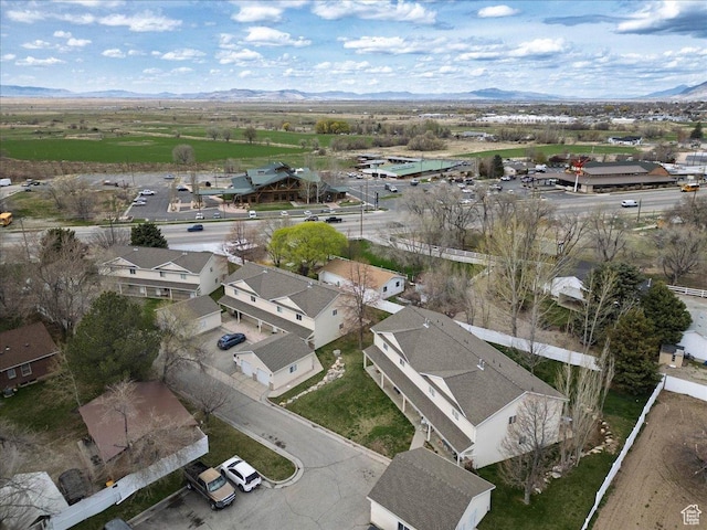 aerial view featuring a mountain view and a residential view