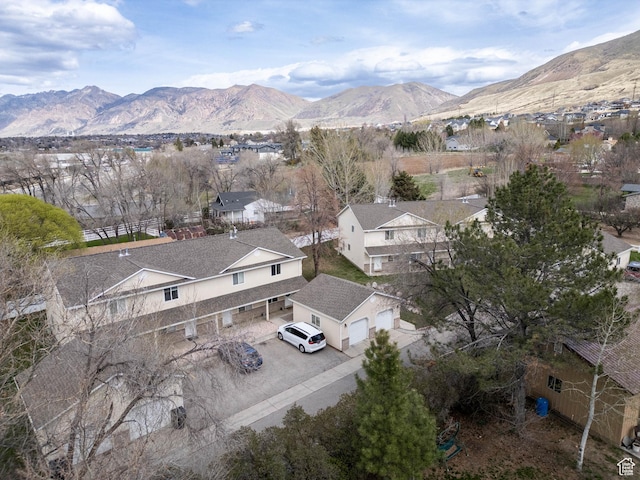 birds eye view of property featuring a mountain view and a residential view