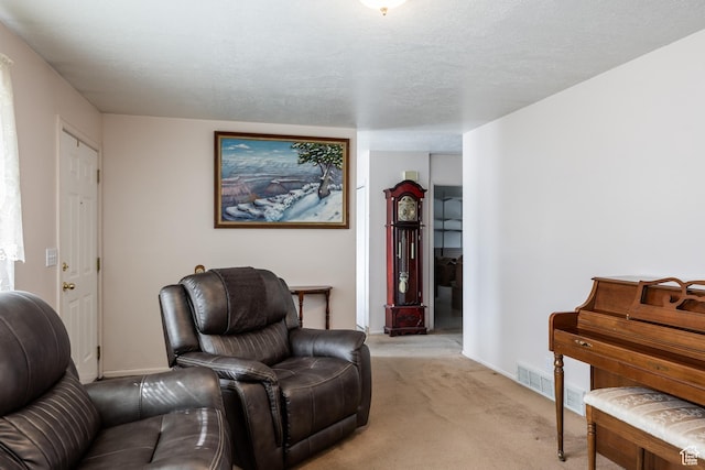 1083 N 1250 W, Layton, UT 84041 - living area featuring visible vents, baseboards, light carpet, and a textured ceiling