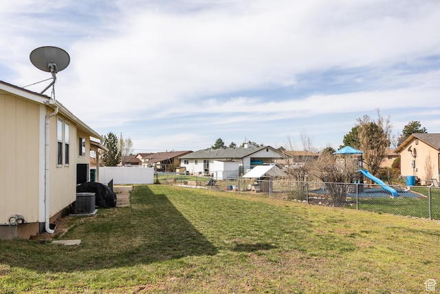 1083 N 1250 W, Layton, UT 84041 - view of yard with a residential view, fence private yard, cooling unit, and a playground