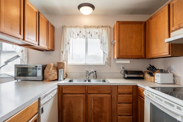 1083 N 1250 W, Layton, UT 84041 - kitchen with a sink, light countertops, white appliances, and brown cabinets