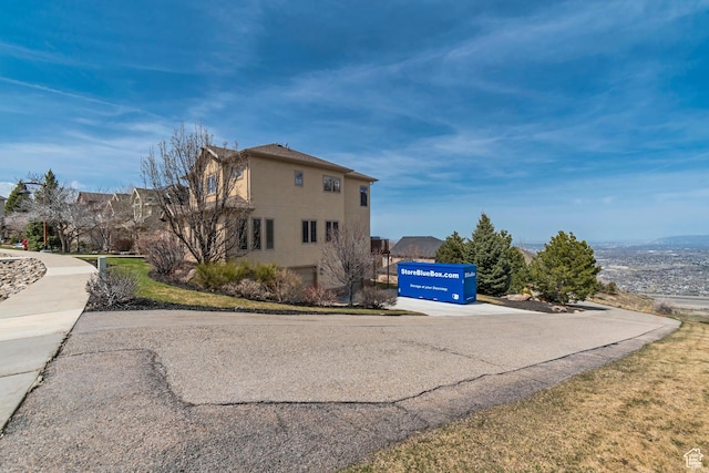 view of home's exterior with stucco siding