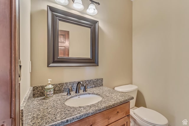 half bath with toilet and vanity