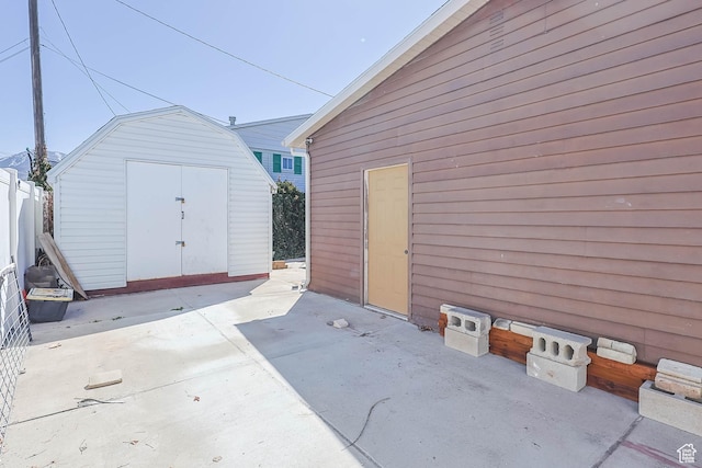 395 Fairlane Dr, Tooele, UT 84074 - exterior space featuring a storage shed and fence