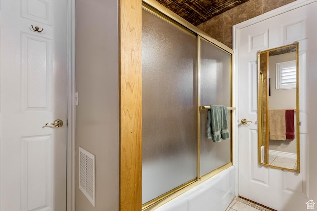 395 Fairlane Dr, Tooele, UT 84074 - full bathroom with combined bath / shower with glass door, tile patterned flooring, and visible vents