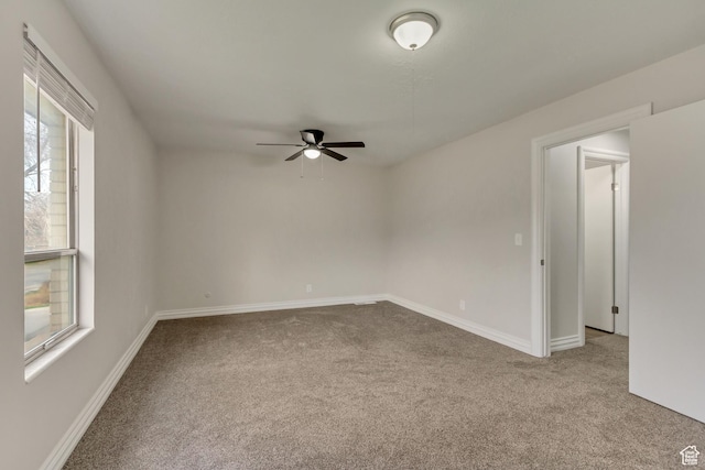 980 Hudson St, Ogden, UT 84404 - spare room featuring baseboards, a ceiling fan, and carpet