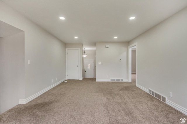 980 Hudson St, Ogden, UT 84404 - carpeted empty room with recessed lighting, visible vents, and baseboards