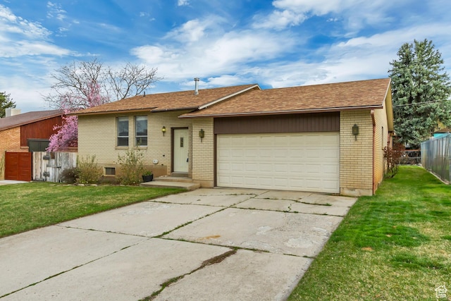 980 Hudson St, Ogden, UT 84404 - ranch-style home featuring a front yard, brick siding, and fence