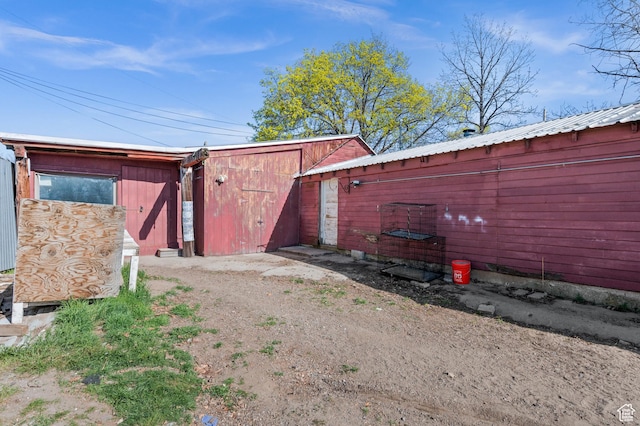 146 W 400 S, Tooele, UT 84074 - view of outbuilding with an outdoor structure and dirt driveway