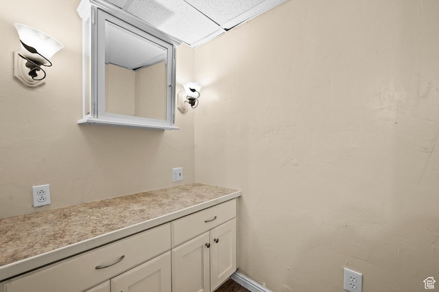 146 W 400 S, Tooele, UT 84074 - bathroom featuring vanity and a drop ceiling