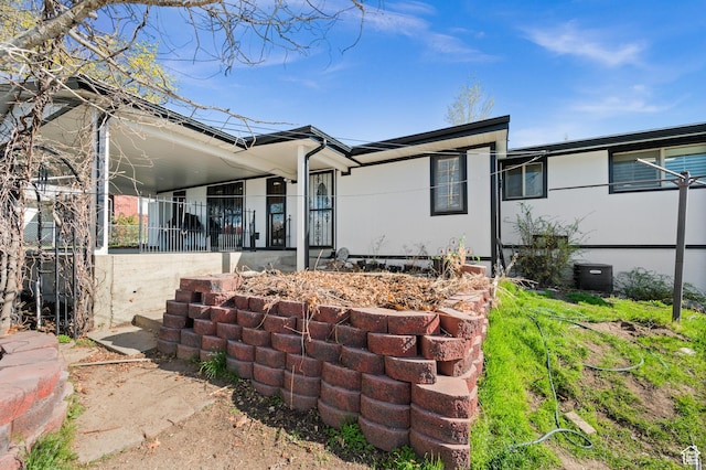 146 W 400 S, Tooele, UT 84074 - rear view of property with covered porch