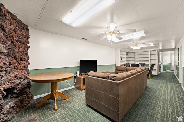 146 W 400 S, Tooele, UT 84074 - living area featuring visible vents, ceiling fan, carpet, and wainscoting