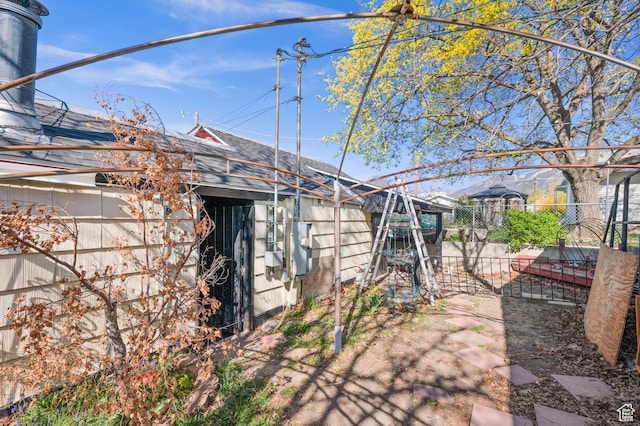 146 W 400 S, Tooele, UT 84074 - view of property exterior featuring roof with shingles and fence