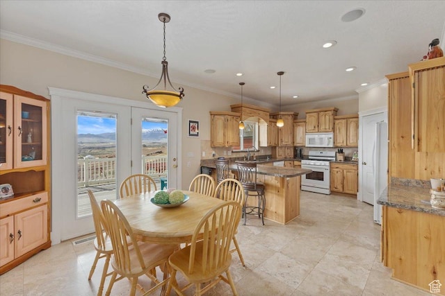 106 N Bear River Blfs, Preston, ID 83263 - dining area featuring ornamental molding and recessed lighting