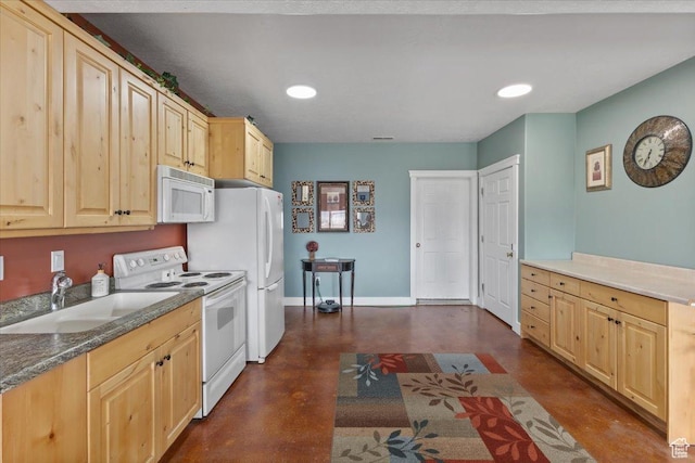 106 N Bear River Blfs, Preston, ID 83263 - kitchen featuring white appliances, concrete flooring, a sink, light brown cabinets, and recessed lighting
