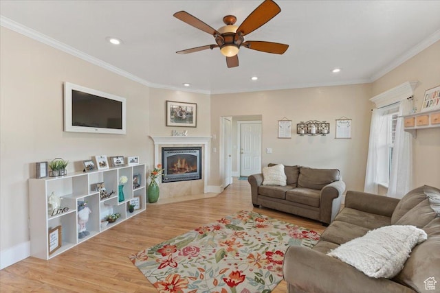 106 N Bear River Blfs, Preston, ID 83263 - living room featuring ceiling fan, light wood-style flooring, a high end fireplace, crown molding, and recessed lighting