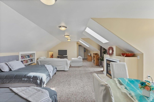106 N Bear River Blfs, Preston, ID 83263 - bedroom with a skylight, light carpet, vaulted ceiling, and a glass covered fireplace