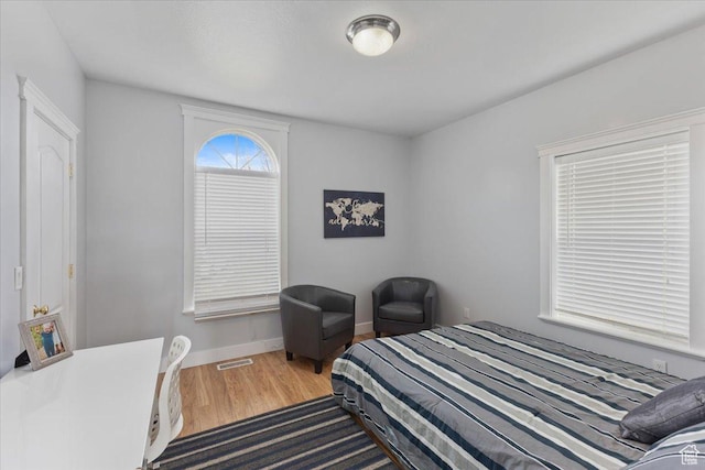 106 N Bear River Blfs, Preston, ID 83263 - bedroom with wood finished floors and baseboards