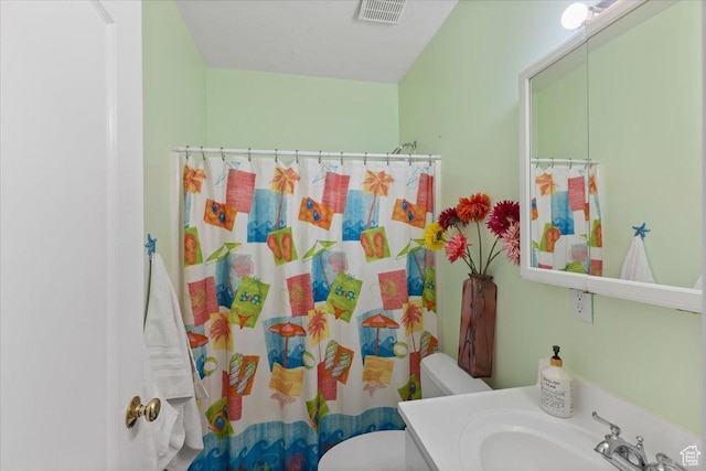 106 N Bear River Blfs, Preston, ID 83263 - full bath featuring toilet, vanity, and a shower with shower curtain