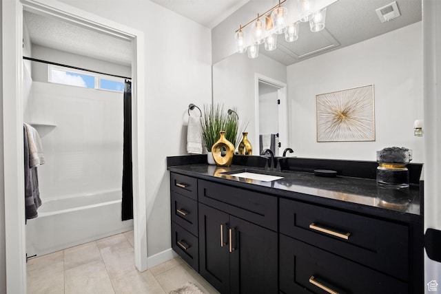 1514 E Livi Ln N Unit 10, Saratoga Springs, UT 84045 - bathroom with vanity, tile patterned floors, shower / bath combo, and baseboards