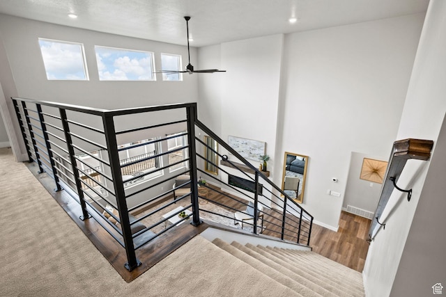 1514 E Livi Ln N Unit 10, Saratoga Springs, UT 84045 - stairway with baseboards, wood finished floors, and recessed lighting