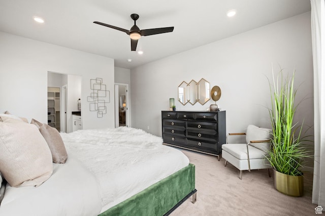 1514 E Livi Ln N Unit 10, Saratoga Springs, UT 84045 - bedroom featuring light colored carpet, a walk in closet, recessed lighting, and a ceiling fan