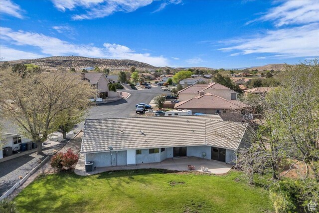 birds eye view of property featuring a residential view and a mountain view