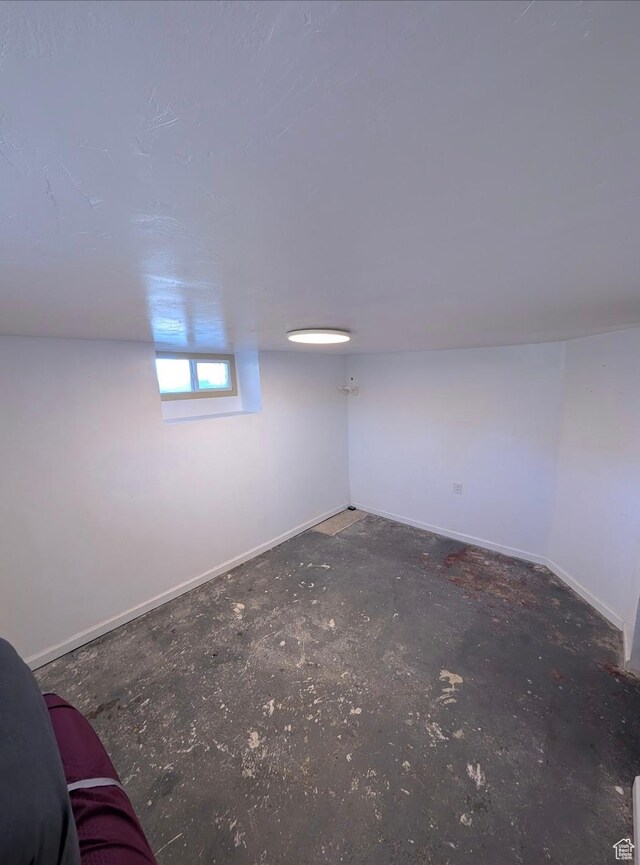 basement featuring baseboards