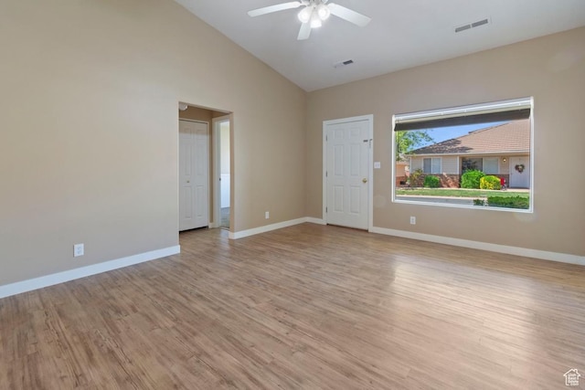 unfurnished room with light wood-type flooring, ceiling fan, baseboards, and visible vents