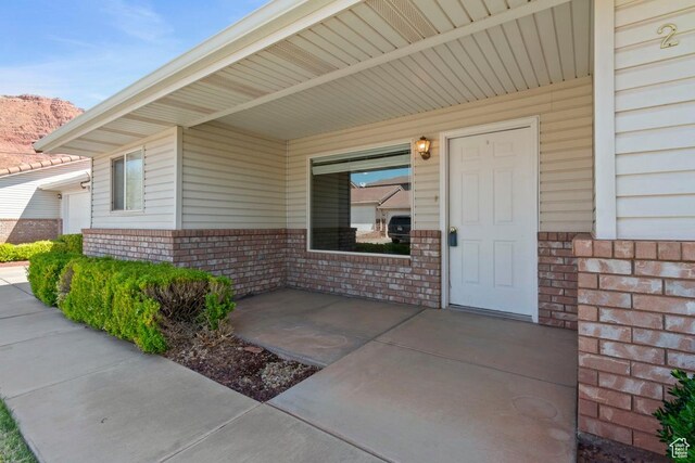 45 W Center St Unit 2, Ivins, UT 84738 - property entrance with brick siding and a mountain view