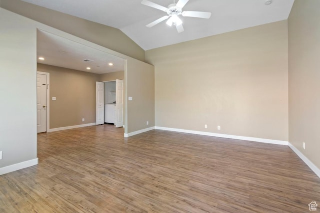 unfurnished room featuring baseboards, recessed lighting, wood finished floors, lofted ceiling, and ceiling fan