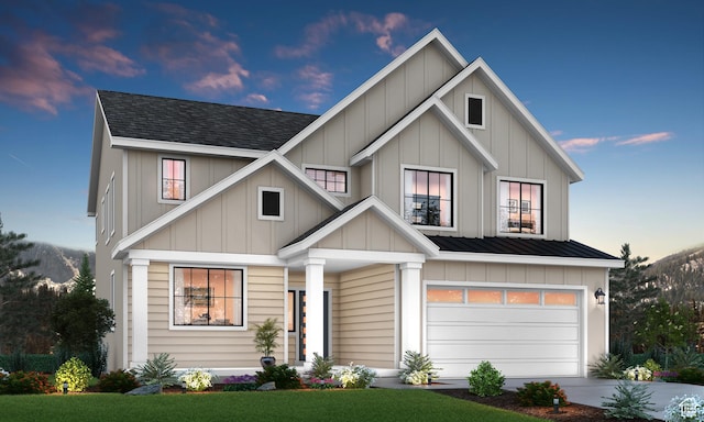 view of front of home featuring board and batten siding, driveway, a garage, and roof with shingles