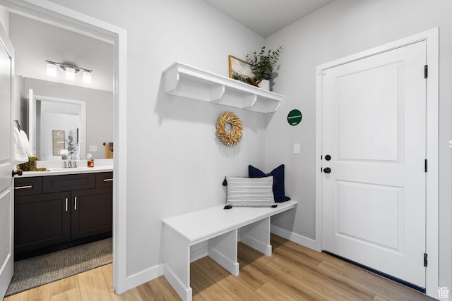 199 N Mia Cv E Unit 12, Saratoga Springs, UT 84045 - mudroom featuring light wood-type flooring, a sink, and baseboards