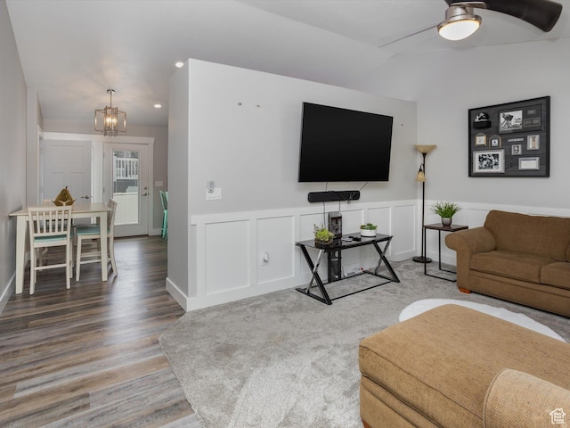 131 Crockett Ave, Logan, UT 84321 - living room with wood finished floors, a chandelier, a ceiling fan, recessed lighting, and wainscoting