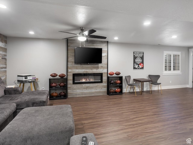 131 Crockett Ave, Logan, UT 84321 - living area featuring a large fireplace, wood finished floors, ceiling fan, baseboards, and recessed lighting