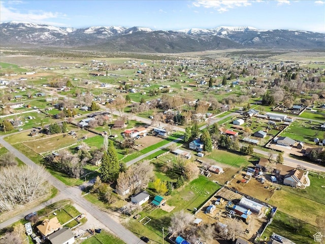 aerial view featuring a mountain view and a residential view