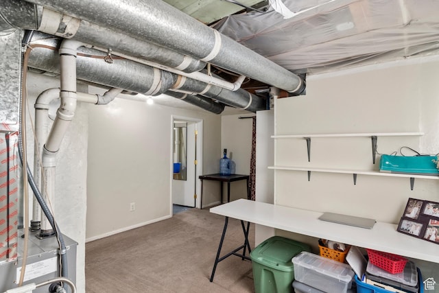 268 S Main St, Malad City, ID 83252 - unfinished below grade area featuring carpet flooring and baseboards