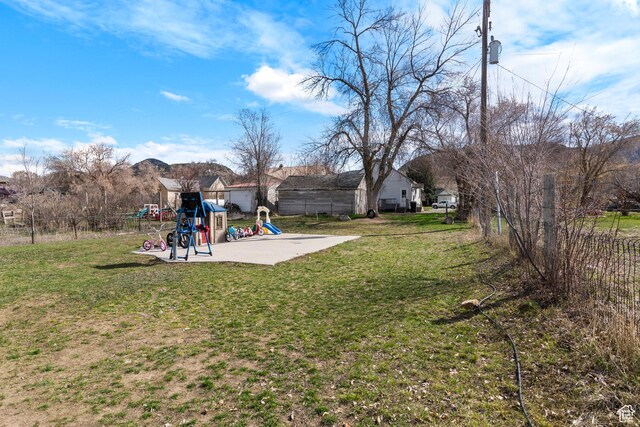 268 S Main St, Malad City, ID 83252 - view of yard with a fenced backyard, a playground, and a patio