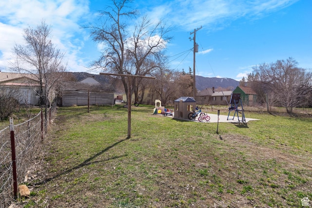 268 S Main St, Malad City, ID 83252 - view of yard with fence and a playground