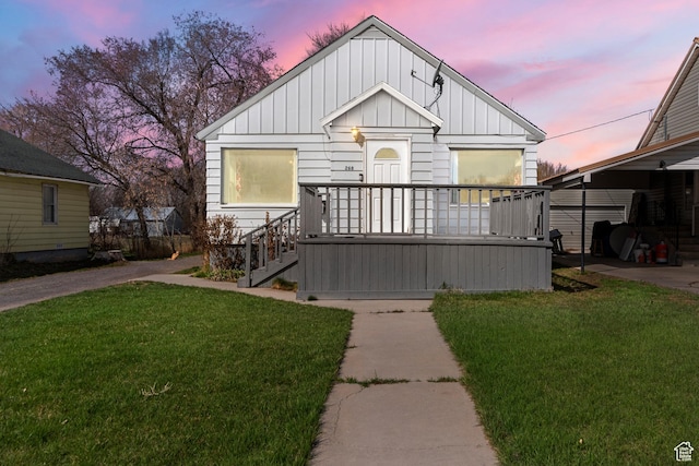 268 S Main St, Malad City, ID 83252 - view of front facade with board and batten siding and a front lawn