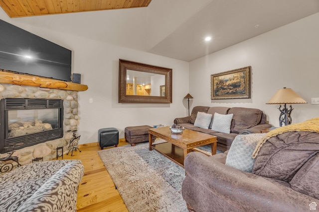 5424 Bobsled Blvd Unit T2, Park City, UT 84098 - living room with a fireplace, vaulted ceiling, wood ceiling, wood finished floors, and baseboards