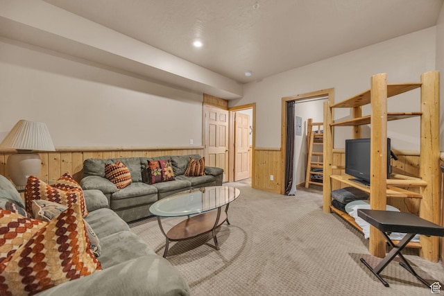 5424 Bobsled Blvd Unit T2, Park City, UT 84098 - living room featuring light carpet, wood walls, and a wainscoted wall