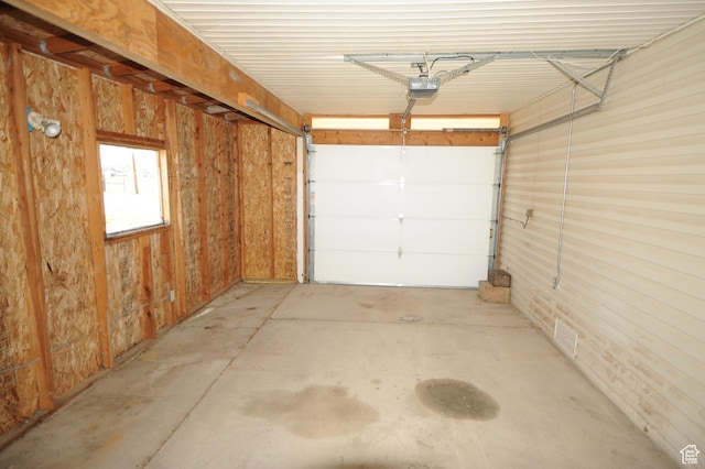 295 E 100 S, Centerfield, UT 84622 - garage with a garage door opener and visible vents